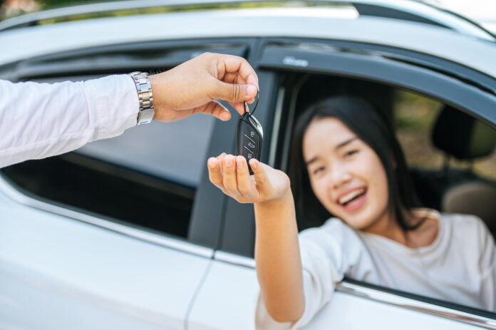 woman reaching for car keys