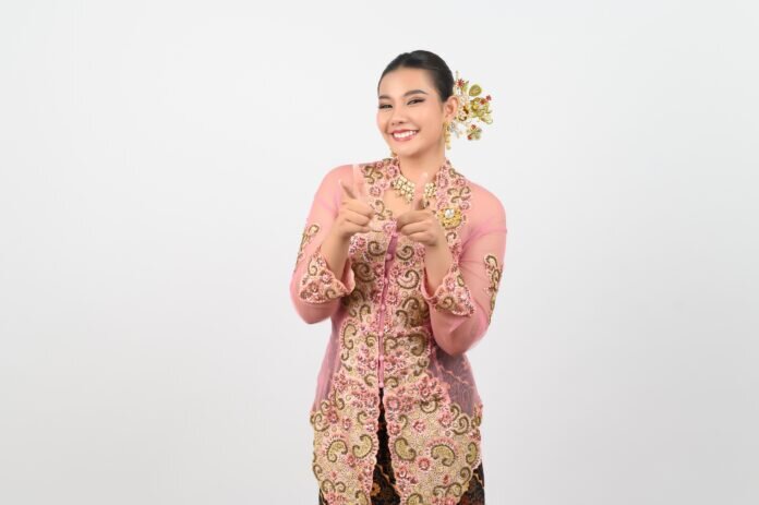 Young beautiful woman dress up in local culture in southern regi